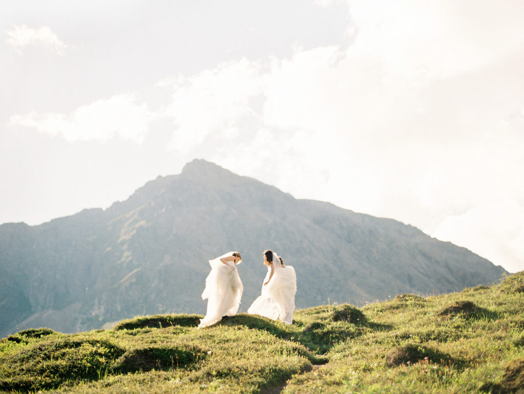 Elope in Alaska on a mountain, two brides