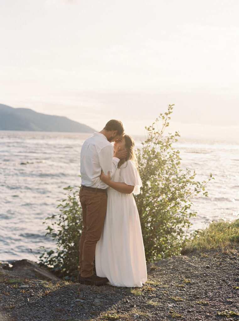 A beluga point elopement in Alaska, toasting with bubbly